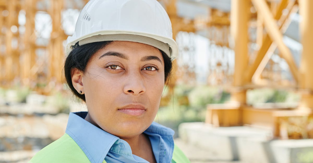 Engineer reviewing construction blueprints