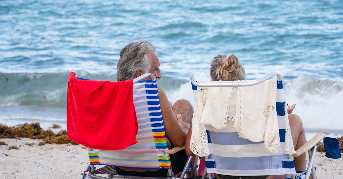 Retired couple enjoying sunset on a Mediterranean terrace