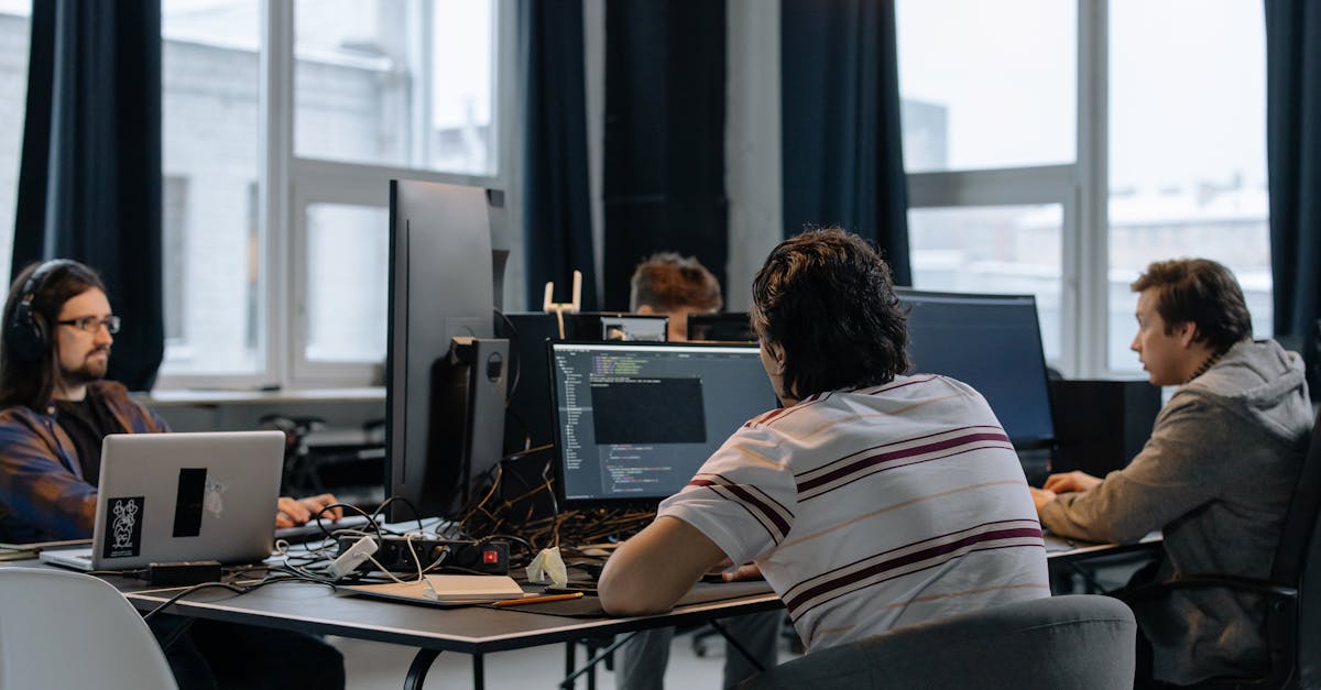 Modern technology workspace with code on screen