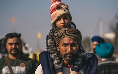 Family at a border checkpoint during conflict